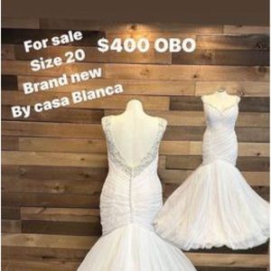 Casablanca bridal  fit-n-flare silhouette has a bodice